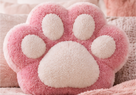 Pink paw-shaped plush pillow